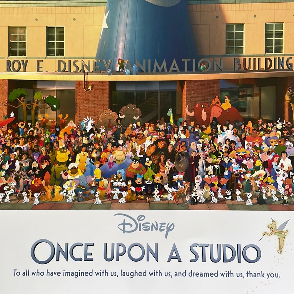 Once upon a studio Disney poster